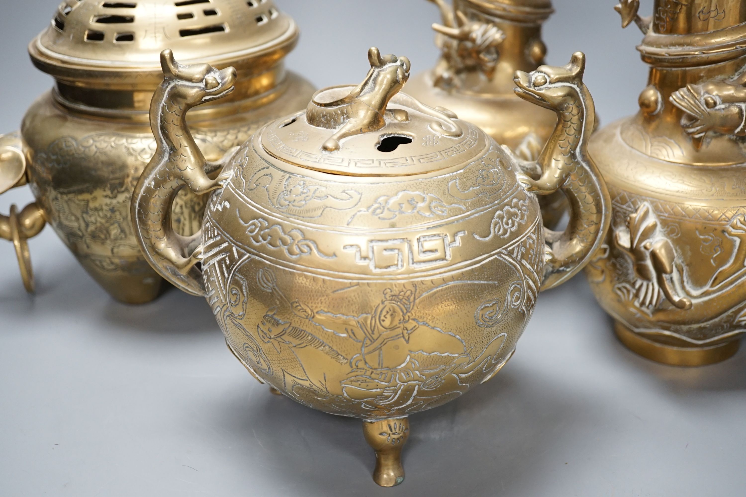 A pair of Chinese brass dragon vases, 26cm, together with two similar incense burners, tallest 30cm high